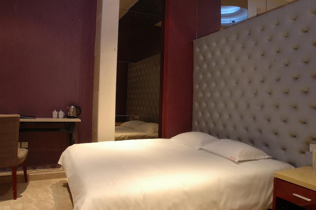 Harbin Yakelai Holiday Hotel Room photo