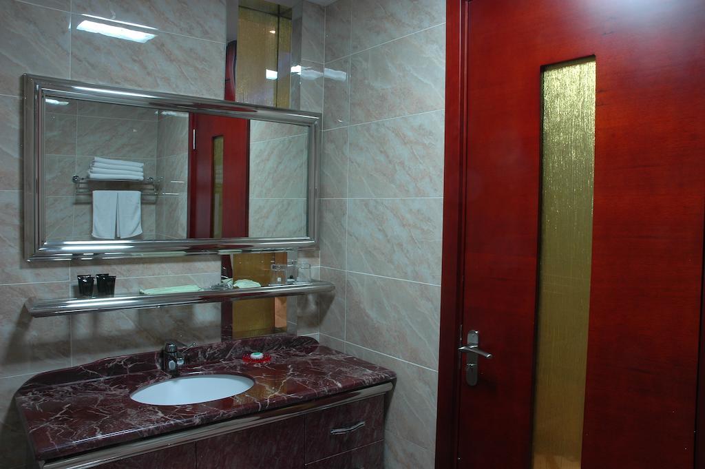 Harbin Yakelai Holiday Hotel Room photo