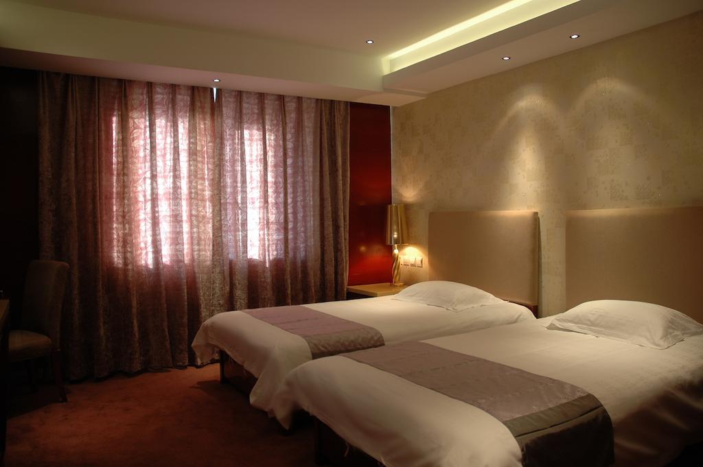Harbin Yakelai Holiday Hotel Room photo