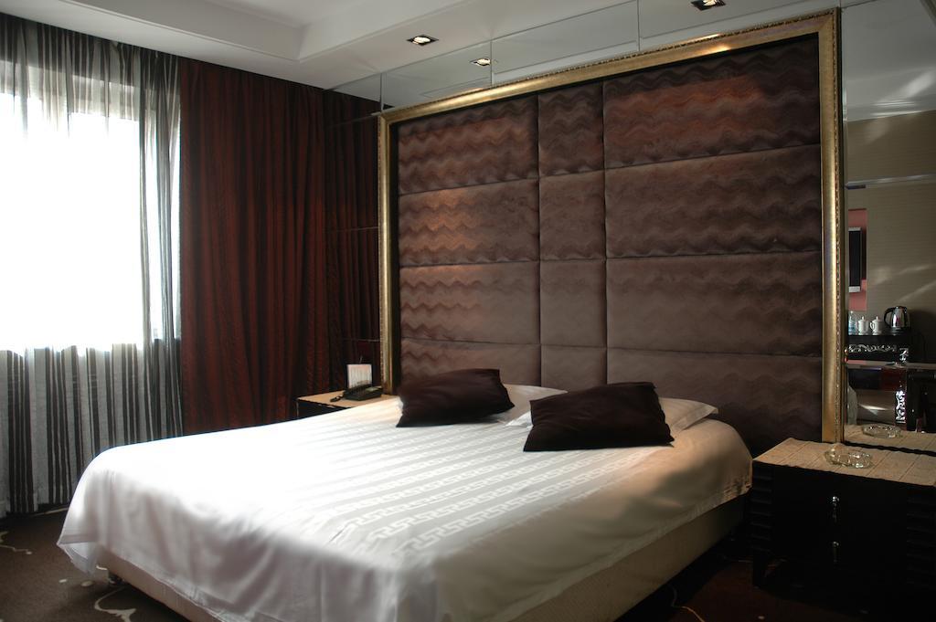 Harbin Yakelai Holiday Hotel Room photo
