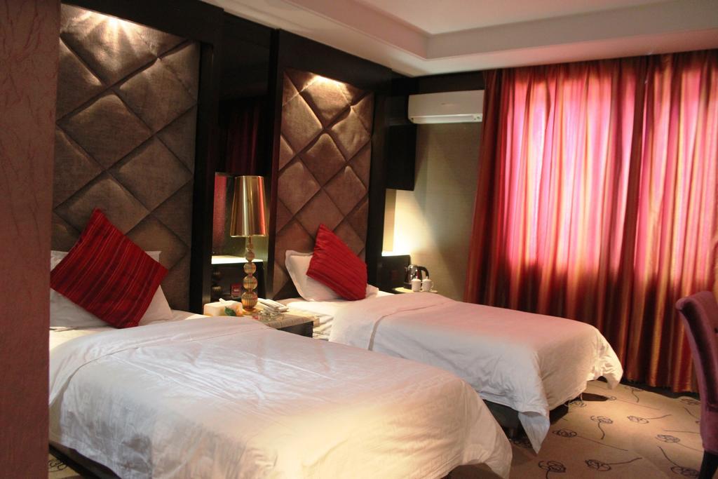 Harbin Yakelai Holiday Hotel Room photo